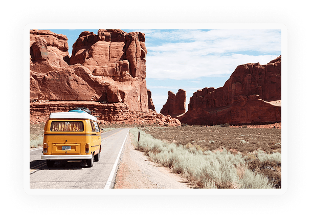 Yellow van on a desert road